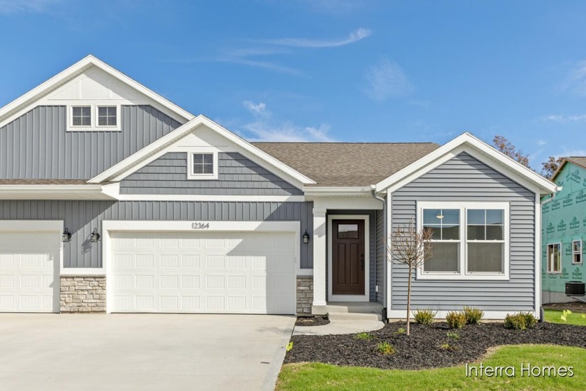 Move-in ready at Stonewater with a Fabulous Treeline View! - Beach Condo for sale in Grand Haven, Michigan on Beachhouse.com