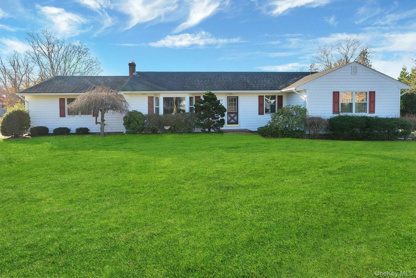 A charming four-bedroom, two-bath, one-level home with a touch - Beach Home for sale in Southold, New York on Beachhouse.com
