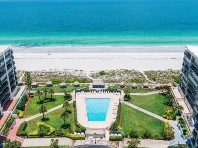 Indulge in beachfront living at its finest in this gated - Beach Condo for sale in Clearwater, Florida on Beachhouse.com