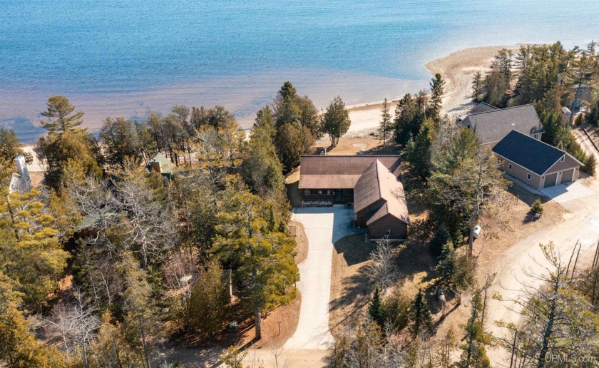 Lakeside living at its finest! This stunning ranch home boasts 3 - Beach Home for sale in Manistique, Michigan on Beachhouse.com