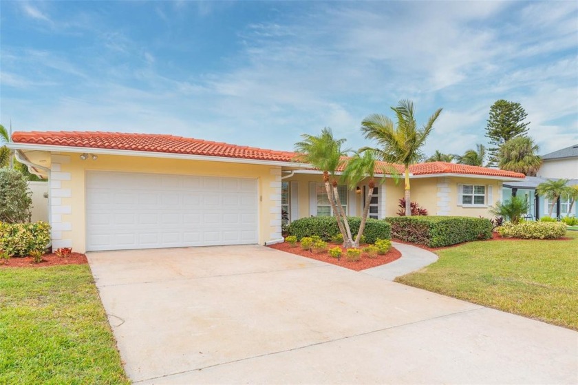 Enjoy a backyard oasis with this 3 bedroom, 2 bath 2 car garage - Beach Home for sale in Tierra Verde, Florida on Beachhouse.com