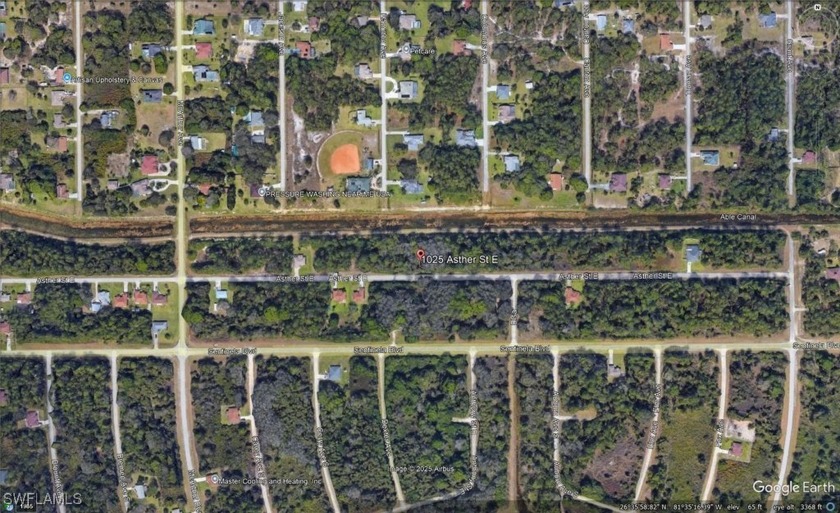 VERY NICE CANAL FRONT LOT * THERE ARE A LOT OF HOUSES IN THE - Beach Lot for sale in Lehigh Acres, Florida on Beachhouse.com