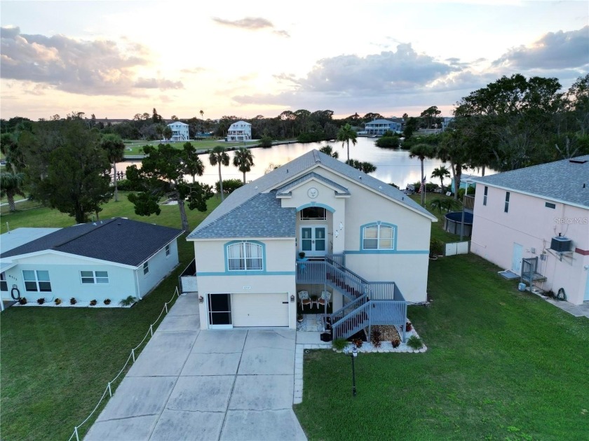Wake up to panoramic water views and sunlight streaming through - Beach Home for sale in New Port Richey, Florida on Beachhouse.com