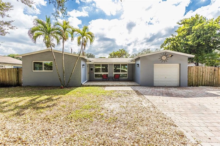 Live your best South Florida life in this charming 3/2 pool home - Beach Home for sale in Cooper City, Florida on Beachhouse.com
