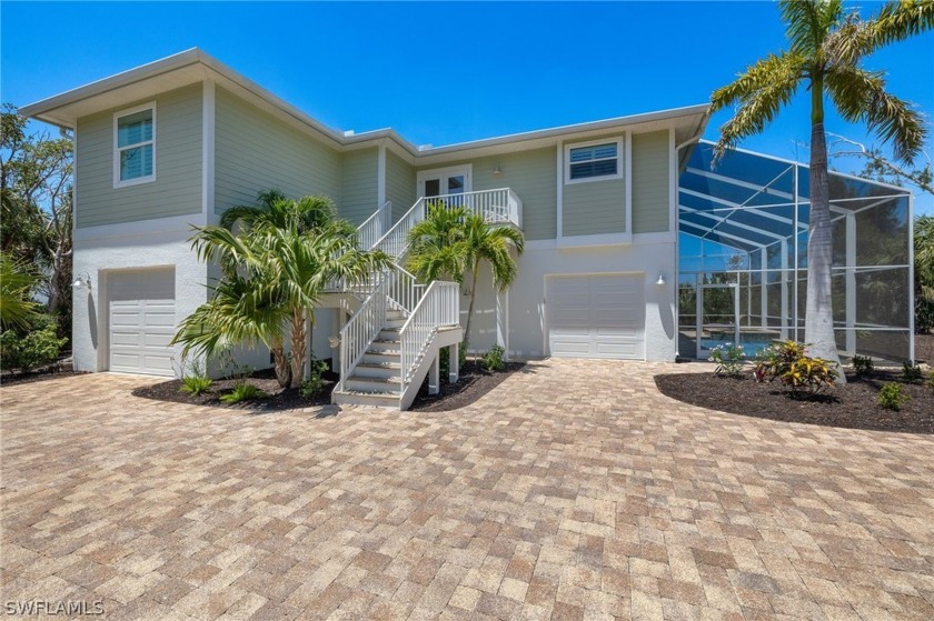 With living area untouched by Ian, this 2017 beautifully - Beach Home for sale in Sanibel, Florida on Beachhouse.com