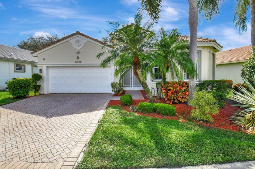 This Spacious Home has a large covered patio where you can relax - Beach Home for sale in Boynton Beach, Florida on Beachhouse.com