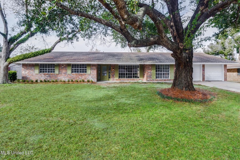 This 4-bedroom, 2.5-bath home in Long Beach is located in an - Beach Home for sale in Long Beach, Mississippi on Beachhouse.com