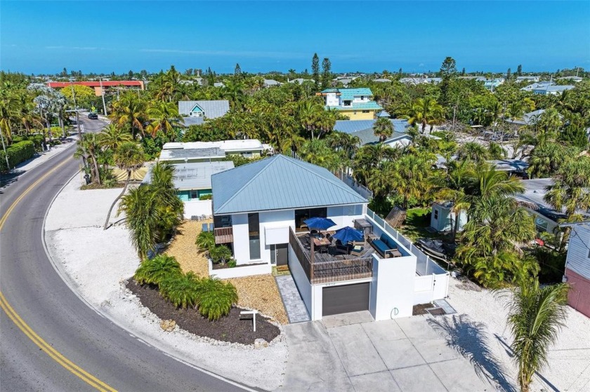 Beautiful sunsets from the rooftop deck with views of the Gulf - Beach Home for sale in Holmes Beach, Florida on Beachhouse.com