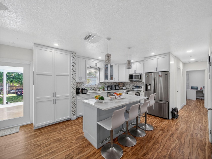 This updated single-family home in the sought-after Lake Clarke - Beach Home for sale in Lake Clarke Shores, Florida on Beachhouse.com