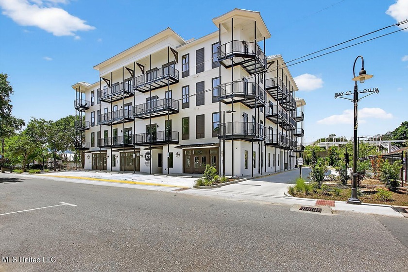 Located in the heart of Old Town Bay St. Louis, this exceptional - Beach Condo for sale in Bay Saint Louis, Mississippi on Beachhouse.com