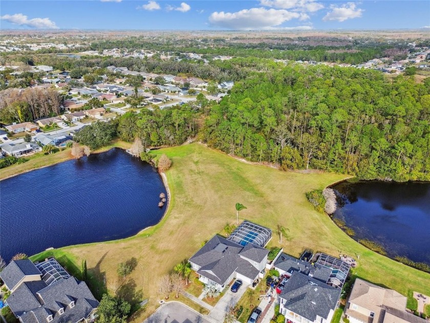 CREATE YOUR DREAM HOME ON THIS SPACIOUS 3.3-ACRE WOODED LOT IN - Beach Acreage for sale in New Port Richey, Florida on Beachhouse.com