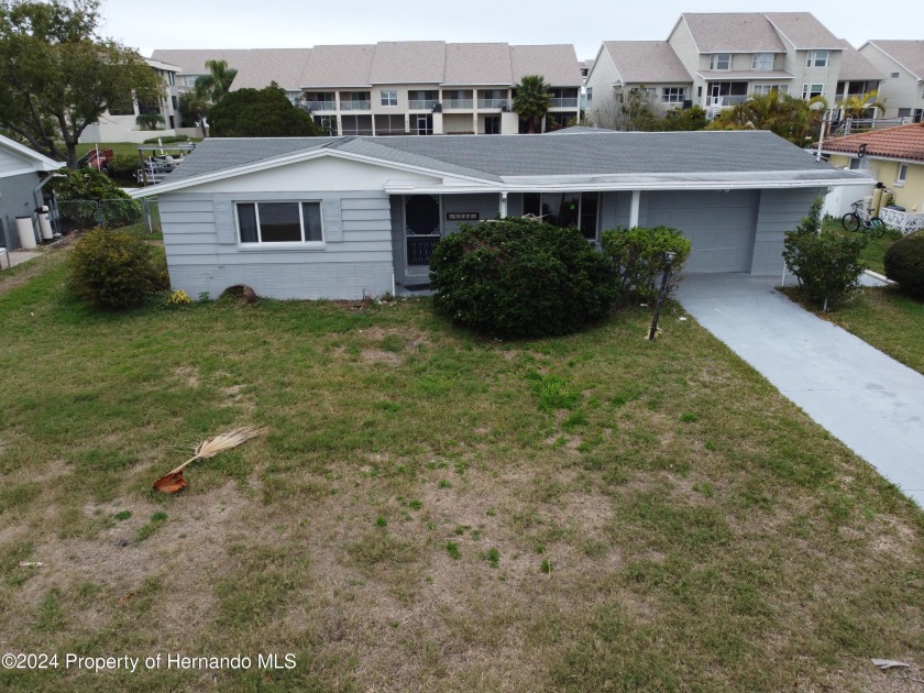 Location matters! This 3 bedroom 2 full bath home is ready for - Beach Home for sale in Port Richey, Florida on Beachhouse.com