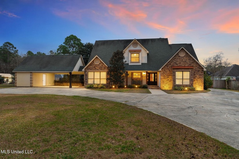 This beautiful, custom-built home on a one-acre lot in Long - Beach Home for sale in Long Beach, Mississippi on Beachhouse.com