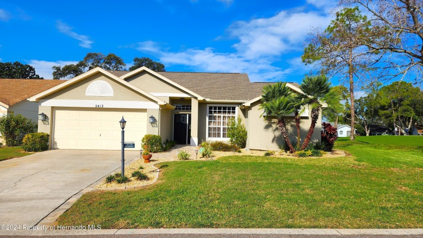 This move-in ready gorgeous split plan home has 2 bedrooms plus - Beach Home for sale in Spring Hill, Florida on Beachhouse.com