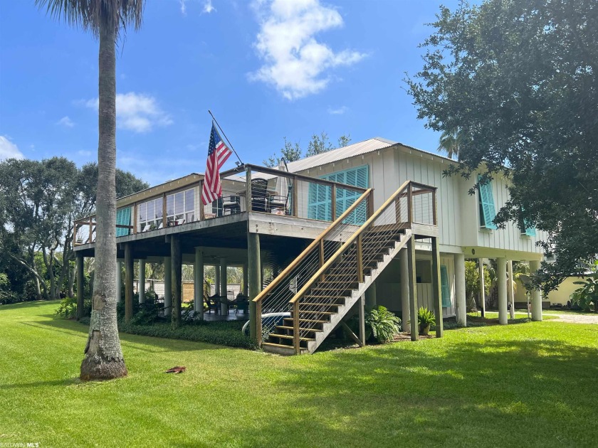 Relax and unwind in this raised beach vacation get-away with - Beach Home for sale in Orange Beach, Alabama on Beachhouse.com