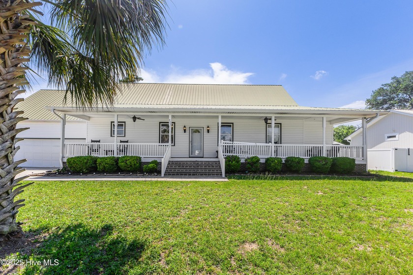 This charming home boasts a durable metal roof and - Beach Home for sale in Oak Island, North Carolina on Beachhouse.com