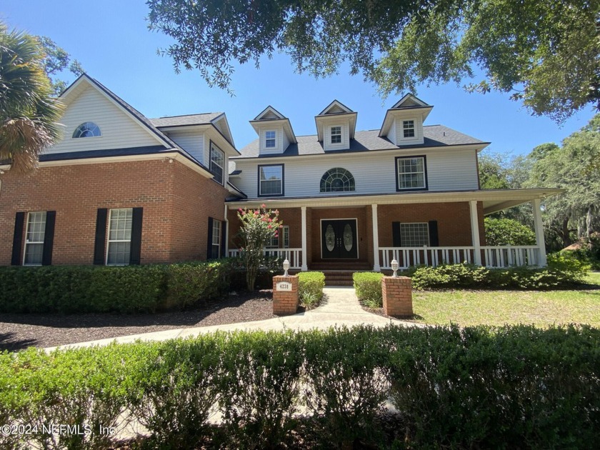 Large 2-story mostly brick home in serene Hidden Hills. Situated - Beach Home for sale in Jacksonville, Florida on Beachhouse.com