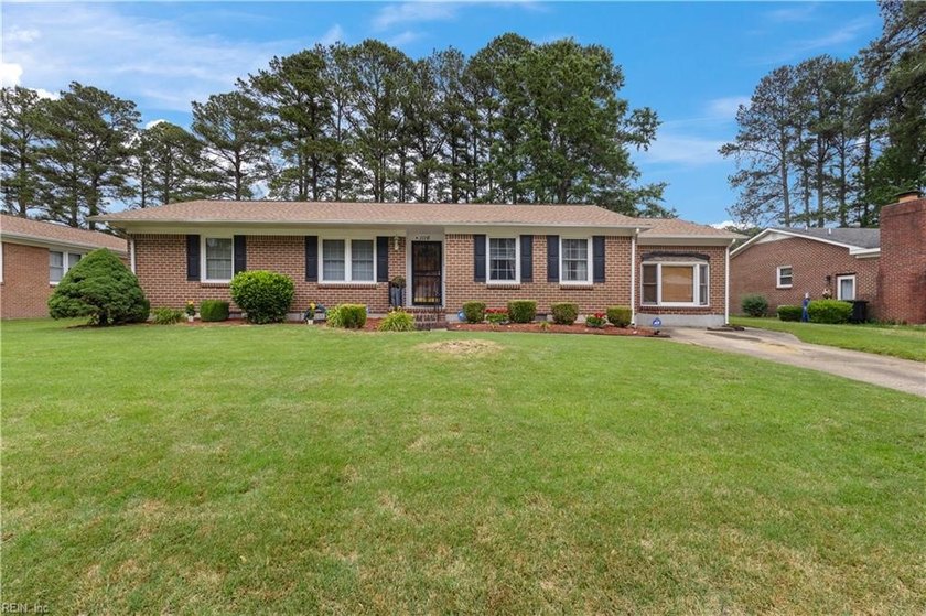 Welcome to this brick ranch nestled along the lake, offering - Beach Home for sale in Portsmouth, Virginia on Beachhouse.com