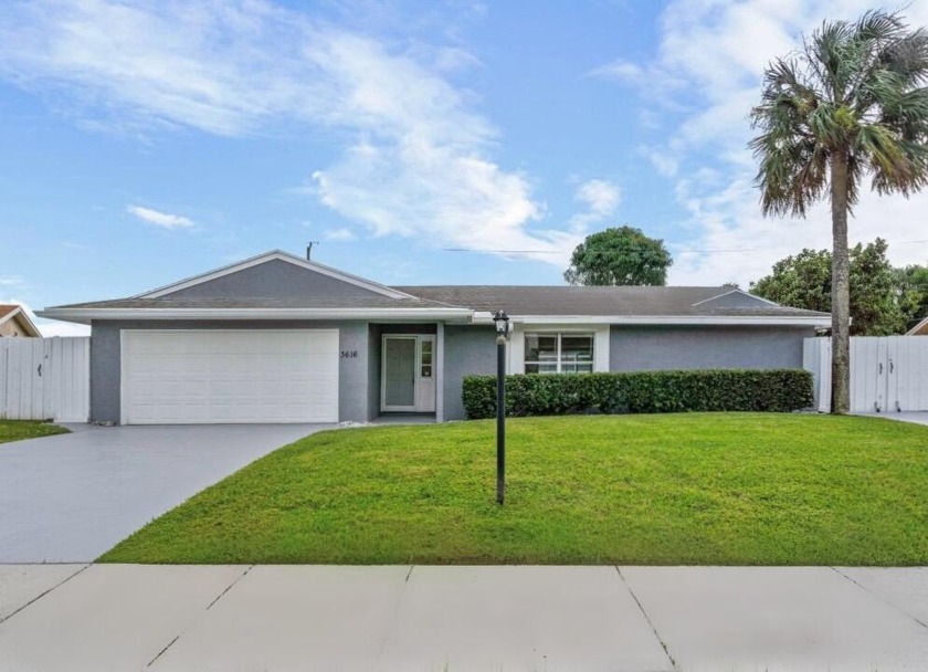 Superbly remodeled single family home with a screened-in pool - Beach Home for sale in Delray Beach, Florida on Beachhouse.com