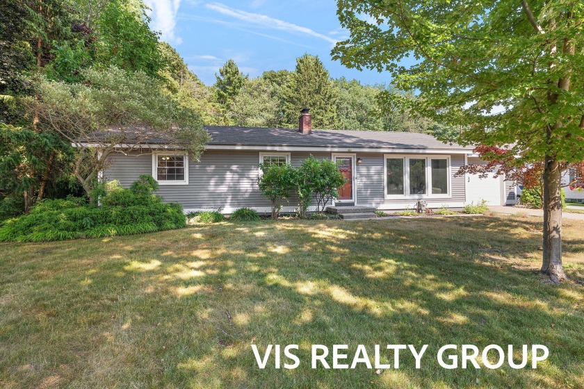 Live Along the Lakeshore! Just under a mile from beautiful - Beach Home for sale in Grand Haven, Michigan on Beachhouse.com