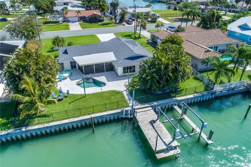 MOVE IN READY - 105 FEET OF WATER FRONTAGE - COMPLETELY - Beach Home for sale in Treasure Island, Florida on Beachhouse.com