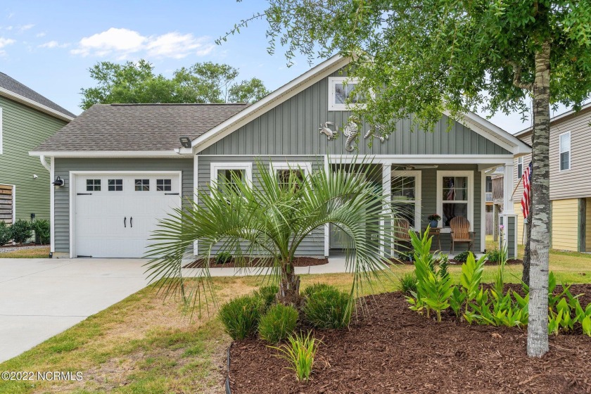 This adorable newer Coastal Cottage is perfectly located just a - Beach Home for sale in Oak Island, North Carolina on Beachhouse.com