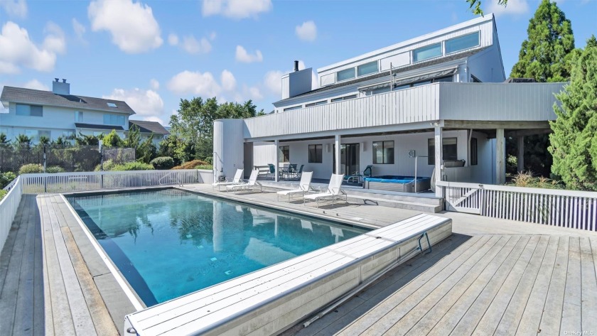 This contemporary home is situated in the desirable, much sought - Beach Home for sale in Westhampton Beach, New York on Beachhouse.com