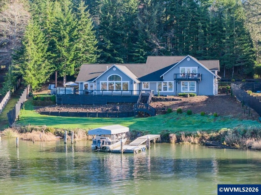 Lakefront living on Devils Lake with approximately 100' of - Beach Home for sale in Otis, Oregon on Beachhouse.com