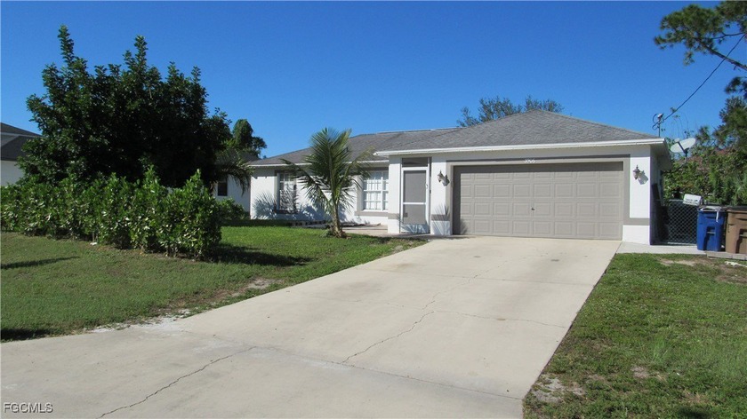 Welcome to this well-maintained 3-bedroom, 2-bathroom family - Beach Home for sale in Lehigh Acres, Florida on Beachhouse.com
