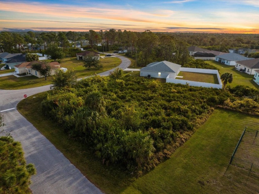 This spacious 0.37-acre corner lot at 12142 Appleberg Circle in - Beach Lot for sale in Port Charlotte, Florida on Beachhouse.com