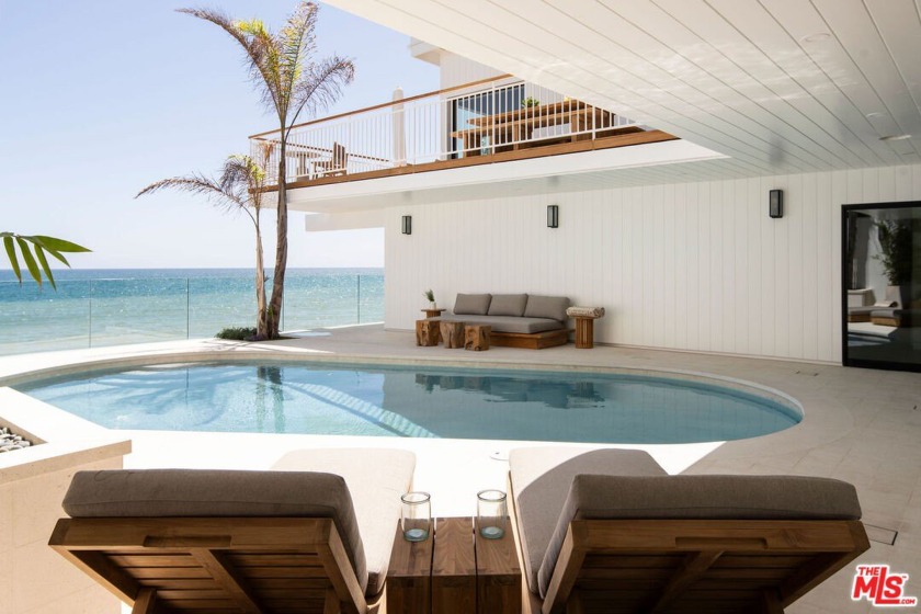 Situated off of PCH on the Private Escondido Beach Road, sits - Beach Home for sale in Malibu, California on Beachhouse.com