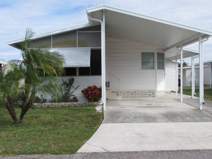 This home has beautiful laminate flooring throughout.  The main - Beach Home for sale in Trinity, Florida on Beachhouse.com