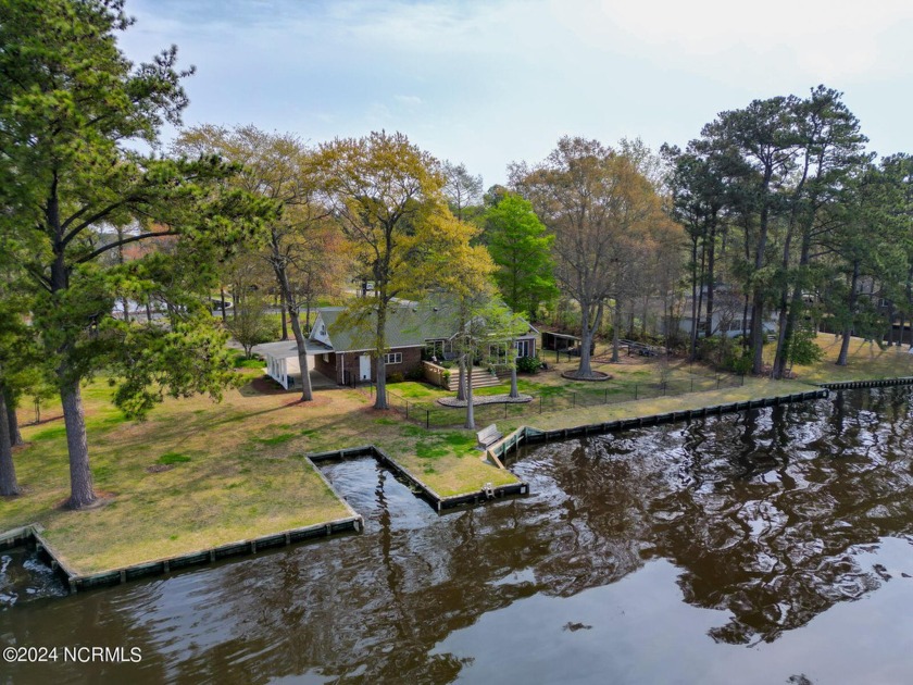 Nestled within a serene waterfront community, this 3 bedroom, 2 - Beach Home for sale in Elizabeth City, North Carolina on Beachhouse.com