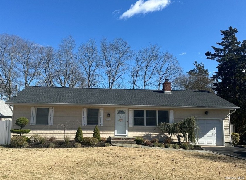 This Gorgeous home is on a Quiet Tree Lined Street in Desirable - Beach Home for sale in Center Moriches, New York on Beachhouse.com
