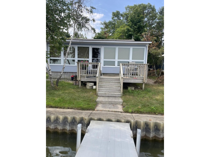 This convenient cottage has a million-dollar view of the Sand - Beach Home for sale in Mears, Michigan on Beachhouse.com