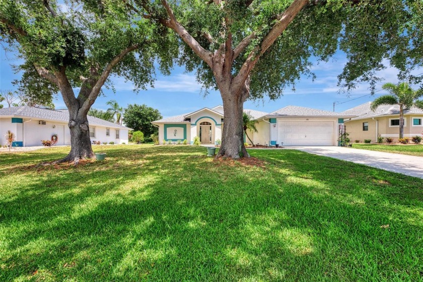 Great Location! A Pool Home with a picturesque canal view. Open - Beach Home for sale in Rotonda West, Florida on Beachhouse.com