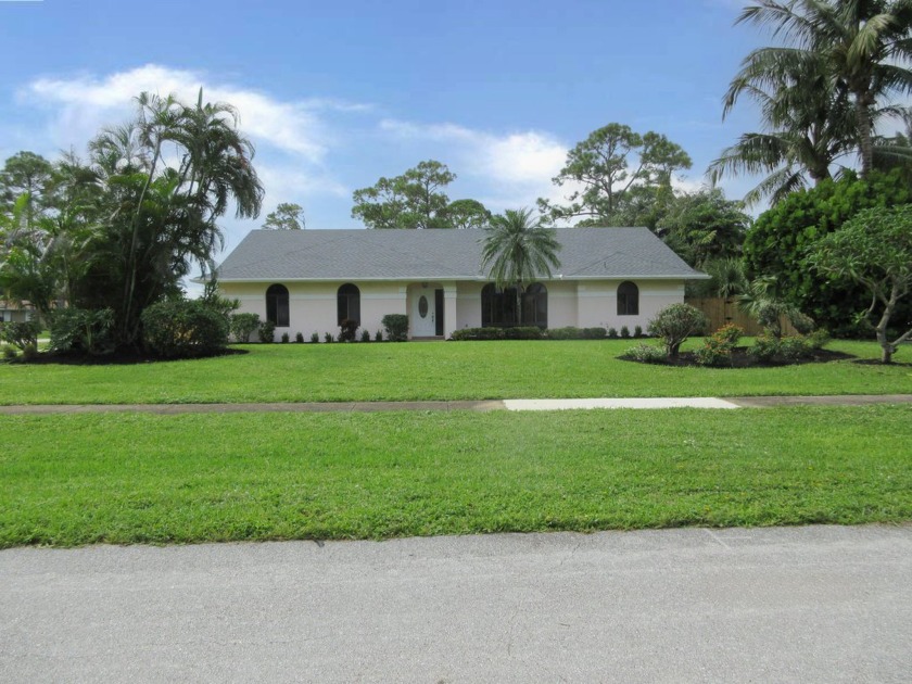 Well maintained 4 bedroom, 3 bath Pool home located between West - Beach Home for sale in Lake Worth, Florida on Beachhouse.com