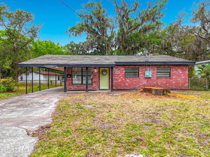 Beautifully updated 4-bedroom, 2-bathroom brick home on over 1 - Beach Home for sale in Jacksonville, Florida on Beachhouse.com