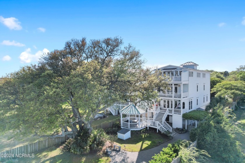 Nestled along the picturesque Intracoastal Waterway with - Beach Home for sale in Wilmington, North Carolina on Beachhouse.com