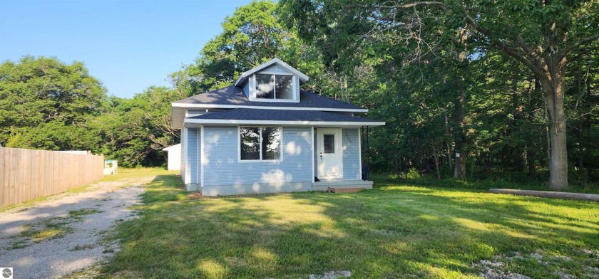 Beautifully remodeled and move-in ready, this 4-bedroom, 2-bath - Beach Home for sale in Oscoda, Michigan on Beachhouse.com