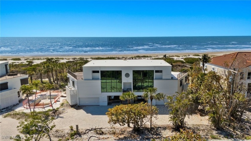 Welcome to a rare and enchanting retreat tucked away in Tigua - Beach Home for sale in Sanibel, Florida on Beachhouse.com