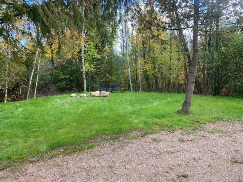 1.29 Acres on the corner of M22 and West Traverse Lake Rd. Zoned - Beach Lot for sale in Maple City, Michigan on Beachhouse.com