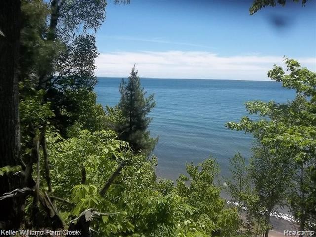 Just under an acre with three waterfront, wooded lots. 192' - Beach Lot for sale in Brevort, Michigan on Beachhouse.com