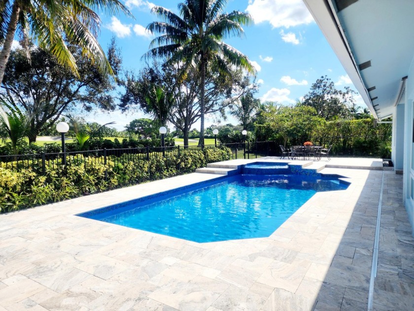 Nestled on a quiet street, this stunning home offers a blend of - Beach Home for sale in Boca Raton, Florida on Beachhouse.com