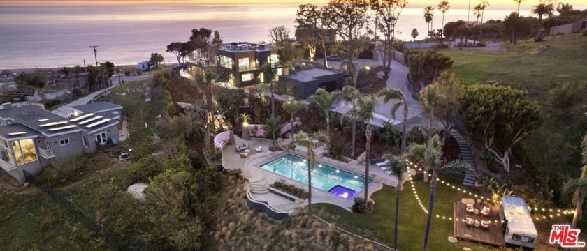 Tucked away at the end of a long, hidden drive, this - Beach Home for sale in Malibu, California on Beachhouse.com