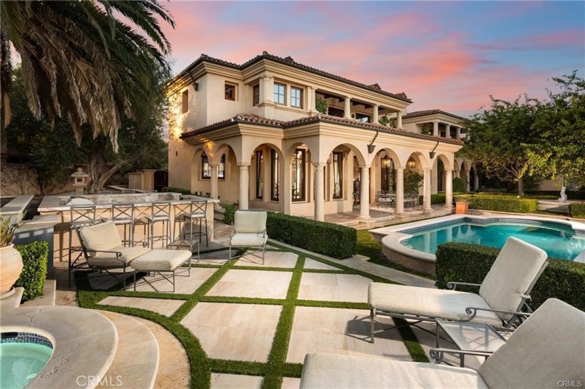 Sited on a prestigious single-loaded street in the guard-gated - Beach Home for sale in Newport Coast, California on Beachhouse.com