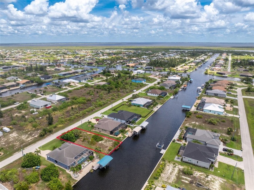 Discover the perfect location to build your dream home on this - Beach Lot for sale in Port Charlotte, Florida on Beachhouse.com