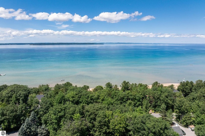 Grand Traverse Bay at its Finest! Welcome to your private - Beach Home for sale in Kewadin, Michigan on Beachhouse.com