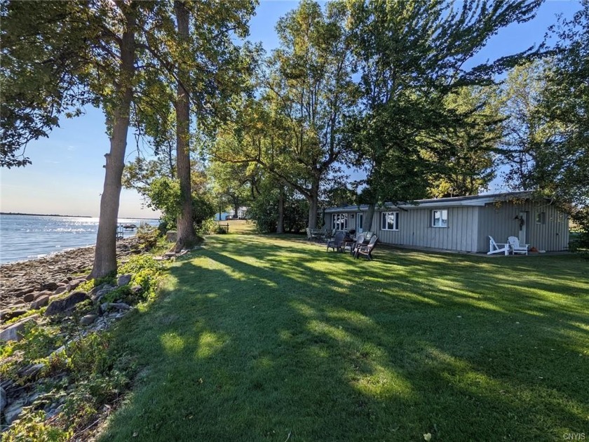 Your Waterfront Retreat awaits! The *Three Mile Retreat* is - Beach Home for sale in Chaumont, New York on Beachhouse.com