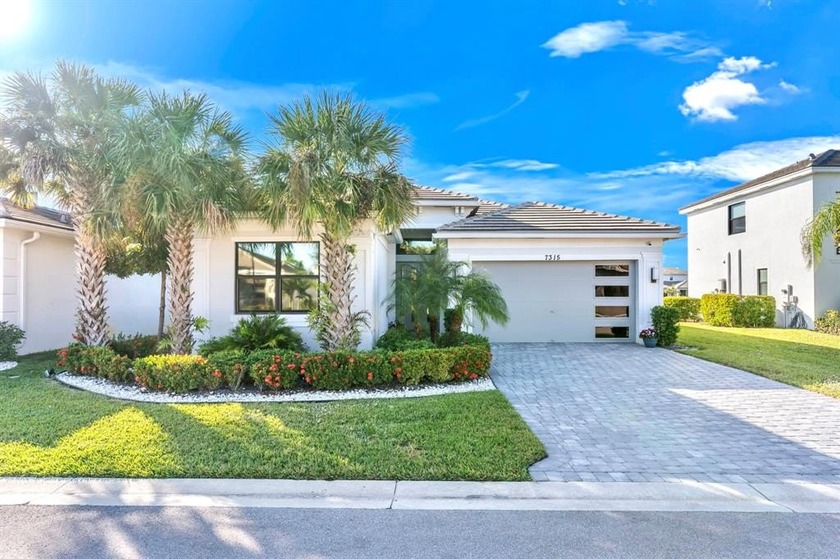 Modern home built in 2022 in a gated community offering serene - Beach Home for sale in Lake Worth, Florida on Beachhouse.com